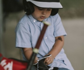 Little boy wearing protective gear Stock Photo