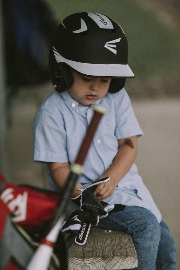 Little boy wearing protective gear Stock Photo
