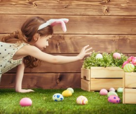 Little girl holding Easter egg Stock Photo