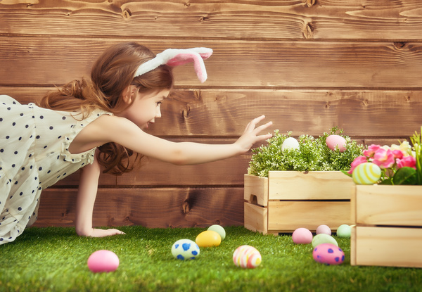 Little girl holding Easter egg Stock Photo