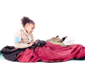 Little girl playing with a telescope Stock Photo