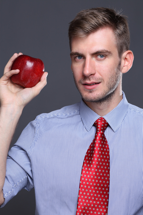 Man holding apple Stock Photo