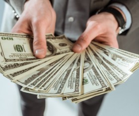 Man holding money Stock Photo 05