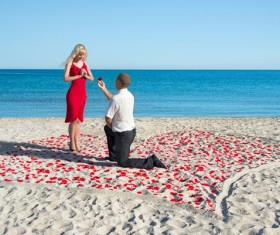 Man on the beach Marriage proposal Stock Photo