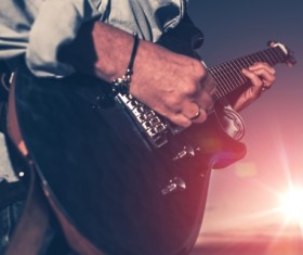 Man playing electric guitar Stock Photo