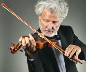 Man playing violin Stock Photo