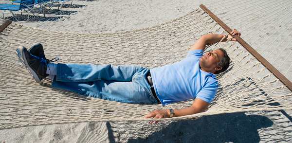 Man resting in hammock Stock Photo 05