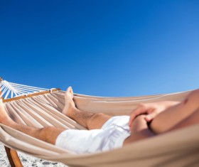 Man resting in hammock Stock Photo 07