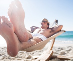 Man resting in hammock Stock Photo 08