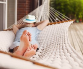 Man resting in hammock Stock Photo 09