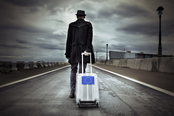 Man traveling with suitcase Stock Photo