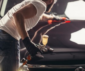 Man washing car Stock Photo