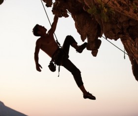 Men free solo rock climbing Stock Photo 01