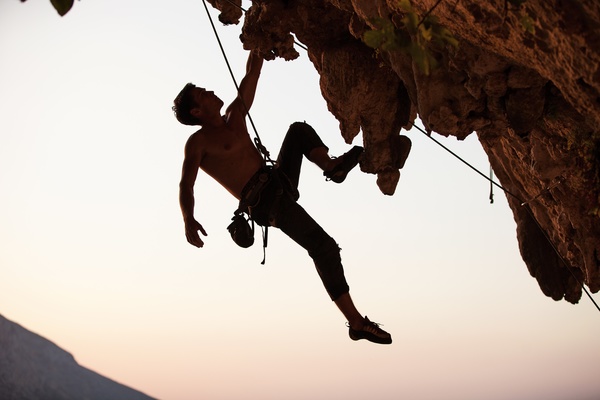 Men free solo rock climbing Stock Photo 01