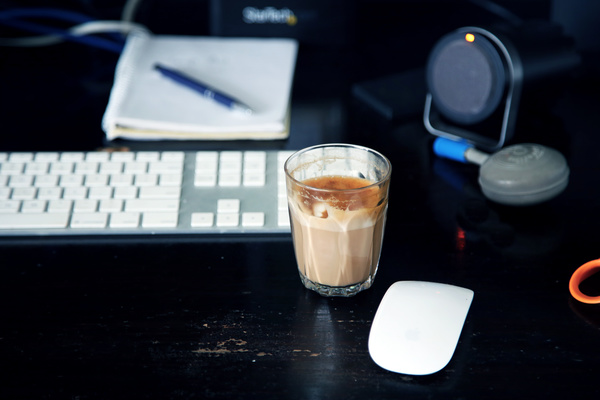Milk coffee on office desk Stock Photo