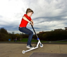 Play scooter little boy Stock Photo 01