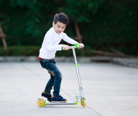 Play scooter little boy Stock Photo 02