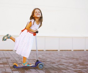 Play scooter little girl Stock Photo 02