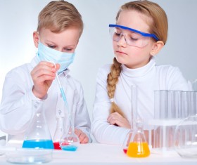 Pupil doing chemistry experiment Stock Photo