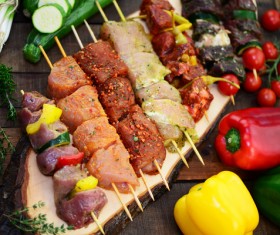 Raw meat skewers and vegetables Stock Photo 04