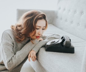 Red lips girl waiting by the phone Stock Photo