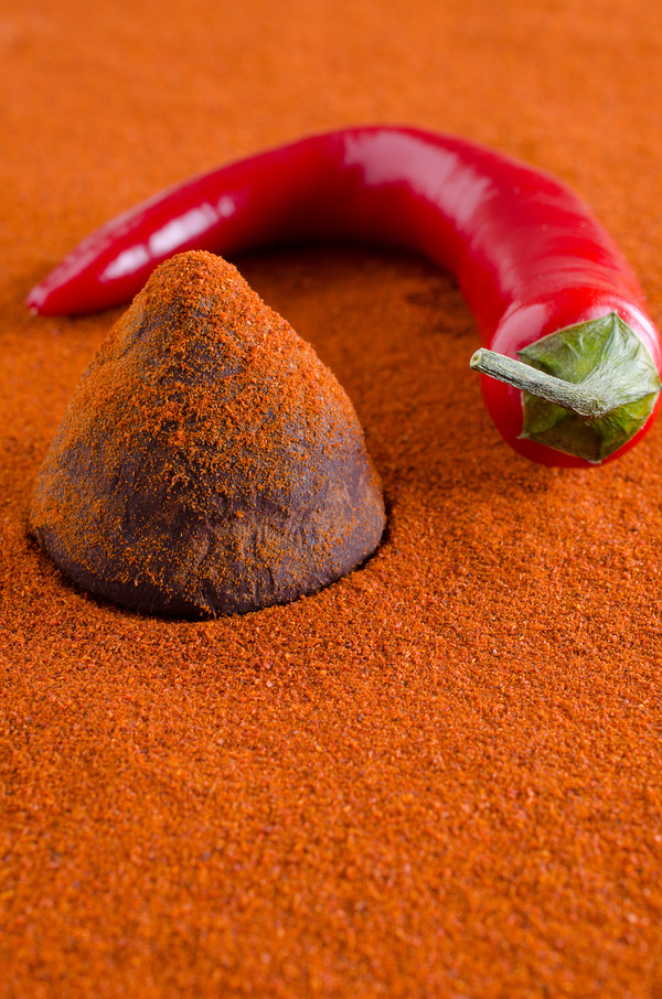 Red pepper and Chocolate truffle Stock Photo