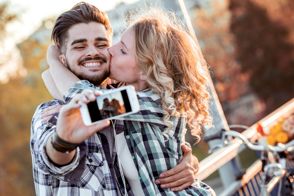 Romantic couple using smart phone selfie Stock Photo 03