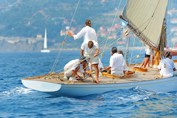 Sailing crew to put rigging in order Stock Photo