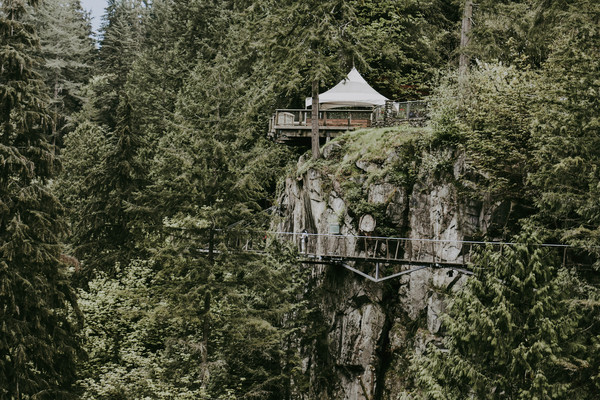 Small house and bridge on wild mountain landscape Stock Photo