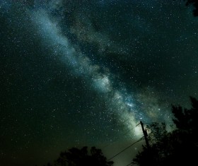 Sparkling bright starry sky at midnight Stock Photo