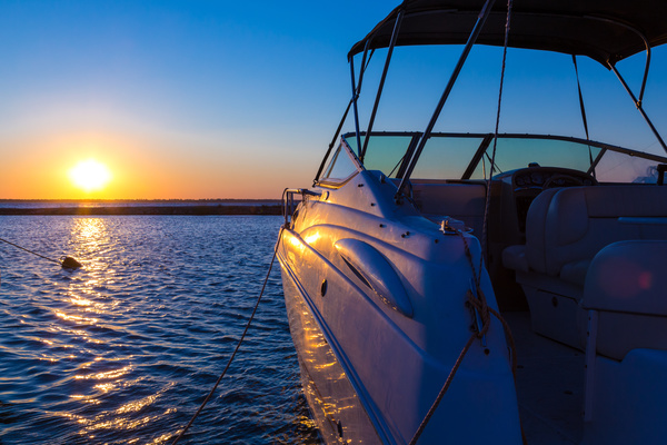 Sunset and docked yacht Stock Photo