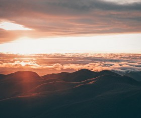 Sunset on high mountain peak Stock Photo