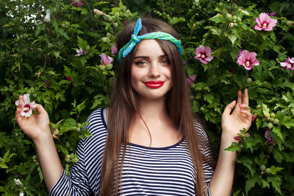 Teen girl and flowers Stock Photo