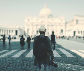Tourist sightseeing man holding camera Stock Photo