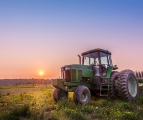 Tractor parked in the farmland Stock Photo