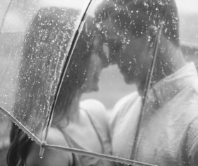 Umbrellas under the couple Stock Photo