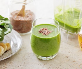 Vegetable juice and honey on the desktop Stock Photo