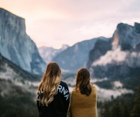 Watch valley scenery with good friends Stock Photo