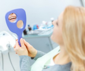 Woman doing dental care Stock Photo 01