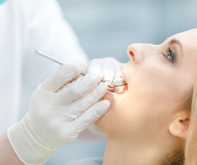 Woman doing dental care Stock Photo 02