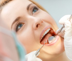 Woman doing dental care Stock Photo 04