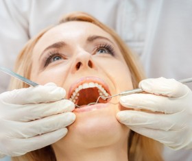 Woman doing dental care Stock Photo 07