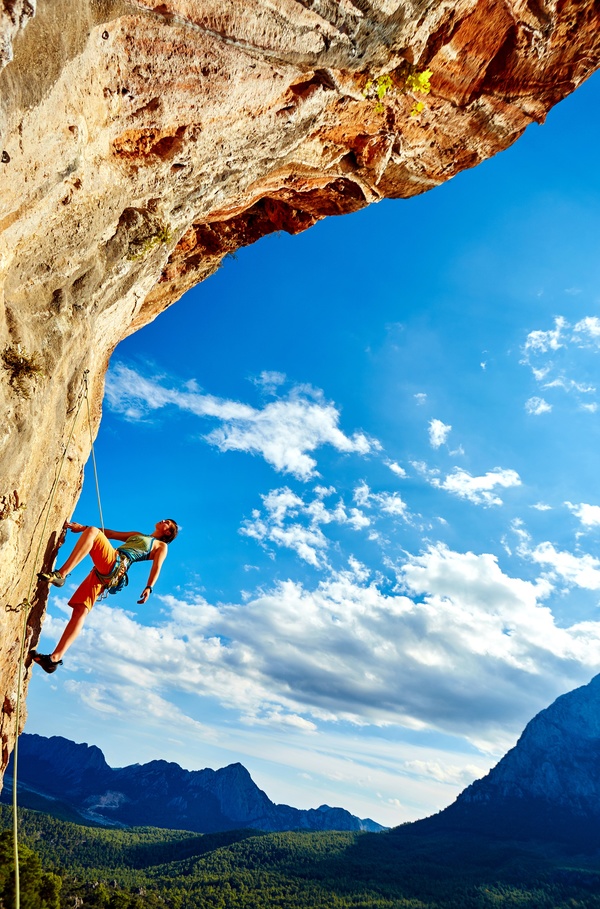 Woman rock climber climbs Stock Photo 01