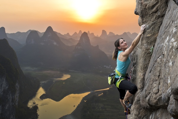 Woman rock climber climbs Stock Photo 04