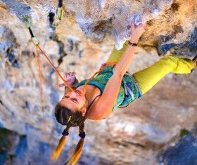 Woman rock climber climbs Stock Photo 06
