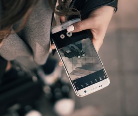 Woman taking photo with smartphone Stock Photo