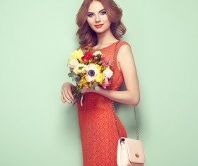 Woman wearing red dress holding flowers pose Stock Photo 01