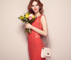Woman wearing red dress holding flowers pose Stock Photo 03