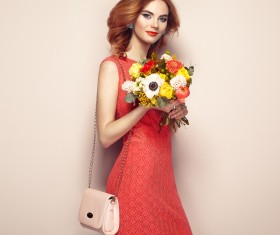 Woman wearing red dress holding flowers pose Stock Photo 06