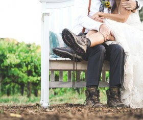 marriage couple hugging on bench Stock Photo